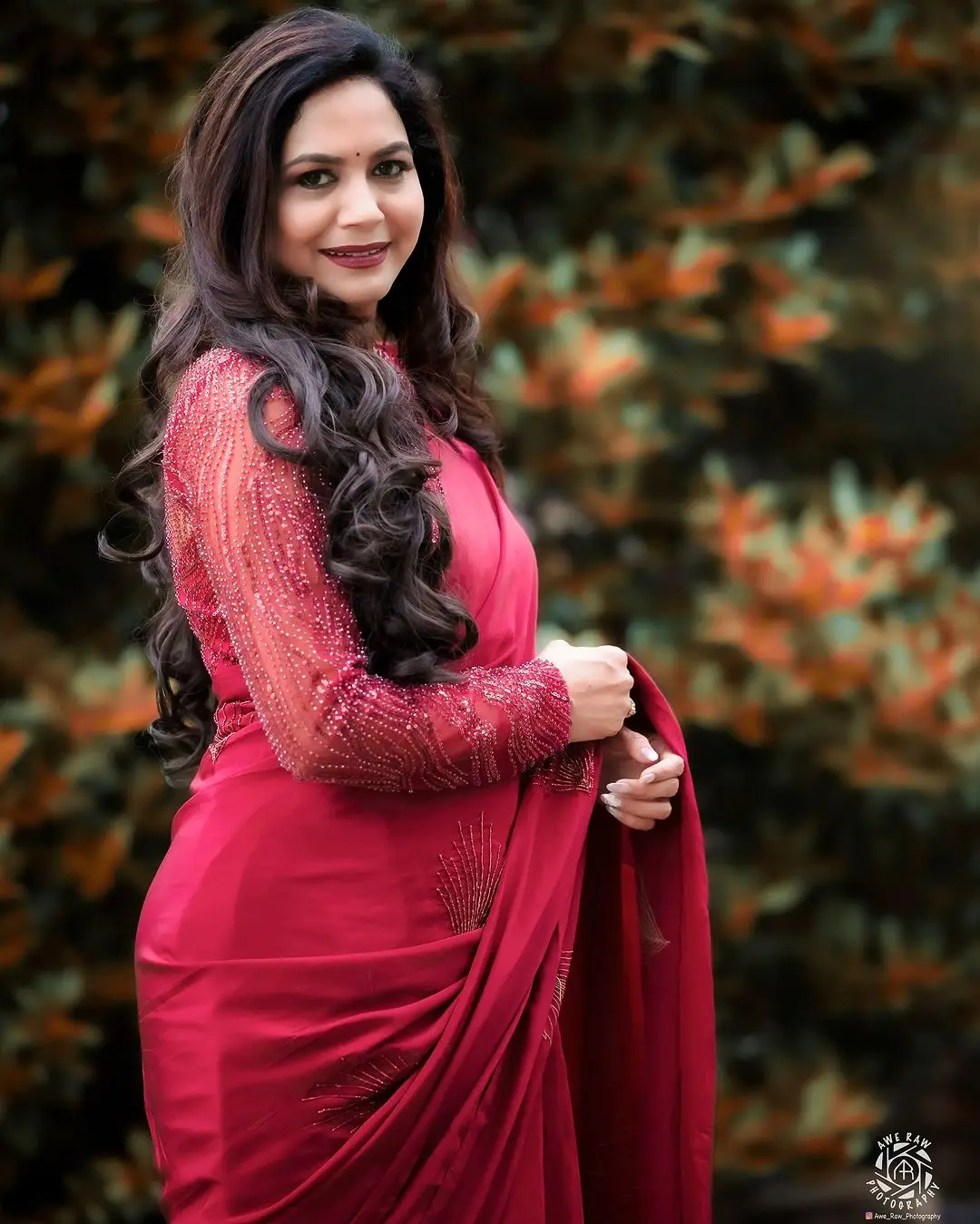 Telugu Singer Sunitha Stills In Maroon Saree Blouse